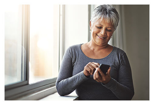 Elderly disability woman happy after receiving social security disability benefits